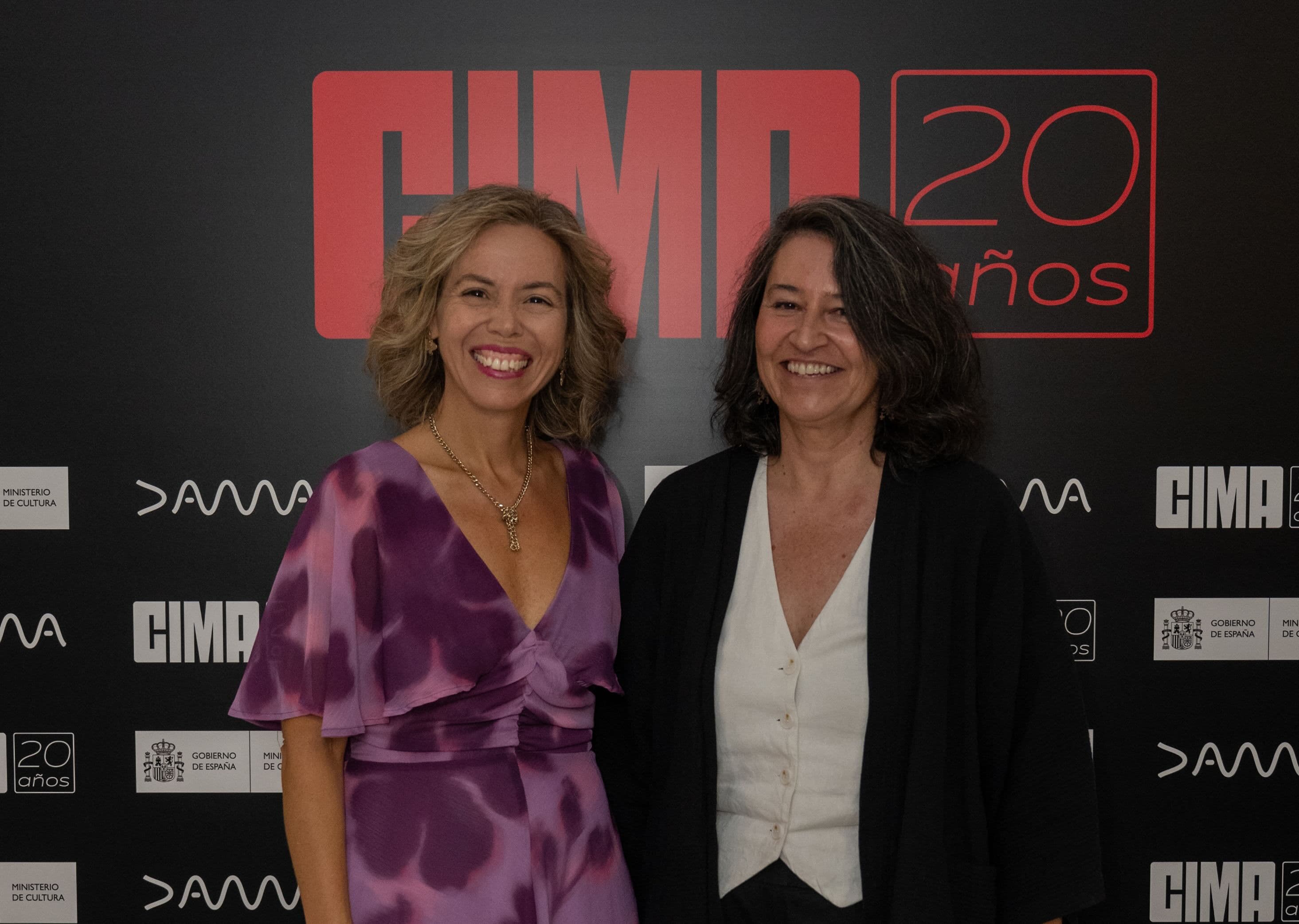 La presidenta de CIMA, Guadalupe Balaguer, y la directora del ICAA, Marta Serrano, posan en el photocall de la Jornada CIMA celebrada en Madrid en septiembre de 2026